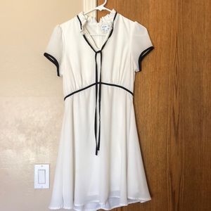 Super cute white dress with black details